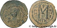 Byzantine coins JUSTINIAN I Type : Follis  Date : an 13  Mint name / Town : Nicomédie  Metal : copper  Diameter : 42  mm Orientation dies : 6  h. Weight : 23,10  g. Rarity : R1  Officine : 2e  Obverse
