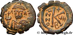 Byzantine coins TIBERIUS II CONSTANTINE Type : Demi-follis  Date : an 4  Mint name / Town : Antioche  Metal : copper  Diameter : 24  mm Orientation dies : 6  h. Weight : 4,89  g. Rarity : R2  Obverse 