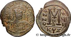 Byzantine coins JUSTINIAN I Type : Follis  Date : an 18  Mint name / Town : Cyzique  Metal : copper  Diameter : 38,5  mm Orientation dies : 6  h. Weight : 20,02  g. Rarity : R1  Officine : 3e  Obverse