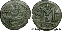 JUSTINIEN Ier (1/08/527-14/11/565) Follis 548-549 N° bby_208887 Date : 548-549 Nom de l'atelier : Cyzique Métal : cuivre Diamètre : 35mm Axe des coins : 11h. Poids : 17,56g. Degré de rareté : R1   Eta