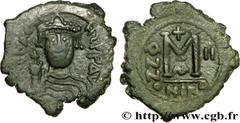 HERACLIUS 5/10/610-11/01/641) Héraclius seul (5/10/610-22/01/613) Follis 611-612 N° bby_209044 Date : 611-612 Nom de l'atelier : Nicomédie Métal : cuivre Diamètre : 31mm Axe des coins : 7h. Poids : 14