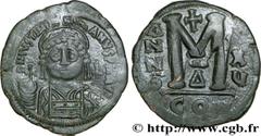 JUSTINIEN Ier(1/08/527-14/11/565) Follis N° v32_0746    Date : 541-542 Nom de l'atelier : Constantinople Métal : cuivre Diamètre : 39mm Axe des coins : 7h. Poids : 22,6g. Degré de rareté : R1 Etat de 