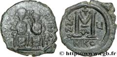 JUSTIN II(15/11/565-5/10/578) Follis N° v32_0754    Date : 569-570 Nom de l'atelier : Nicomédie Métal : cuivre Diamètre : 30mm Axe des coins : 6h. Poids : 12,57g. Etat de conservation : TTB/TTB+ Prix 