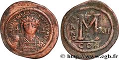 Byzantine coins JUSTINIAN I Type : Follis  Date : an 12  Mint name / Town : Constantinople  Metal : copper  Diameter : 41,5  mm Orientation dies : 6  h. Weight : 23,07  g. Rarity : R1  Officine : 1re 