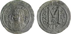 Byzantine Coins JUSTINIAN I (527-565). Follis. Nicomedia. Dated RY 13 (539/40). Obv: D N IVSTINIANVS P P AVG. Helmeted and cuirassed bust facing, holding globus cruciger and shield decorated with hors