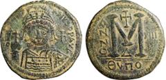 Byzantine Coins JUSTINIAN I (527-565). Follis. Theopoulis (Antioch). Dated RY 13 (539/40). Obv: D N IVSTINIANVS P P AVG. Helmeted and cuirassed bust facing, holding globus cruciger and shield decorate