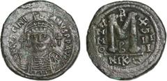 Byzantine Coins JUSTINIAN I (527-565). Follis. Nicomedia. Dated RY 18 (544/5). Obv: D N IVSTINIANVS P P AVG. Helmeted and cuirassed bust facing, holding globus cruciger and shield decorated with horse