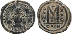Byzantine Coins JUSTINIAN I (527-565). Follis. Constantinople. Dated RY 25 (551/2). Obv: D N IVSTINIANVS P P AVG. Helmeted and cuirassed bust facing, holding globus cruciger and shield decorated with 