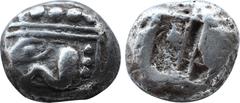 GREEK COINS Greek LYCIA. Phaselis. Circa 500-480 BC. Stater (Silver, 17 mm, 10.82 g). Forepart of a galley to left, terminating in a boar's forepart; below, [dolphin]. Rev. Incuse square divided by tw