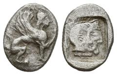 Greek Coins Greek Coins DYNASTS OF LYCIA. Uvug Circa 470-440 BC . . Uncertain mint. Obv: Sphinx seated right, raising forepaw. Rev: Female head right within pelleted square border; all within incuse s