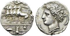 GREECE GREECE Dyonisos I, 406-367 BC. Silver Decadrachm 400 BC. Obv. Fast quadriga driven left by charioteer, holding reins and kentron; in field above, Nike flying right to crown him. In exergue, dis