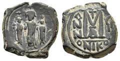 Byzantine Coins HERACLIUS with MARTINA and HERACLIUS CONSTANTINE (610-641).Nicomedia. Follis. Obv : Heraclius, in centre, flanked by Martina, on left, and Heraclius Constantine, on right, each wearing