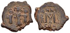 Byzantine Coins HERACLIUS.HERACLIUS CONSTANTINE and MARTINA.(610-641).Constantinople.Follis. Obv : Heraclius, in center, flanked by Martina, on left, and Heraclius Constantine, on right, each wearing 