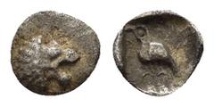 GREEK COINS CARIA.Mylasa.(Circa 420-390 BC). Tetartemorion. Obv : Forepart of lion left, head reverted. Rev : Bird standing left; two pellets in field. SNG Kayhan 947 var. EX BIGA. Condition : The coi