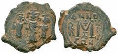 Byzantine Coins HERACLIUS.HERACLIUS CONSTANTINE and MARTINA. 610-641 AD.Constantinople Mint. AE Follis Obverse : Heraclius, in center, flanked by Martina, on left, and Heraclius Constantine, on right,