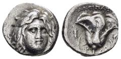 Greek Coins ISLANDS of CARIA.Rhodos.Rhodes.(Circa 275-250 BC).Didrachm. Obv : Head of Helios three-quarter facing right. Rev : ΑΝΤΙΠΑΤΡΟΣ. Above rose with one bud to right; Ρ / Ο on either side of sta