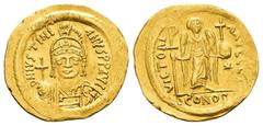 Byzantine Coins JUSTINIAN I.(527-565).Constantinople.Solidus. Obv : D N IVSTINIANVS P P AVG. Helmeted and cuirassed bust facing, holding globus cruciger and shield. Rev : VICTORIA AVGGG I CONOB. Victo
