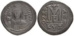 Byzantine Coins JUSTINIAN I.(527-565).Cyzikos.Follis. Obv : D N IVSTINIANVS P P AVG. Helmeted and cuirassed bust facing, holding globus cruciger and shield; cross to right. Rev : Large M between ANNO 