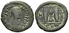 Byzantine Coins JUSTINIAN I.(527-565).Constantinople.Follis. Obv : D N IVSTINIANVS PP AVG. Diademed, draped and cuirassed bust right Rev : Large M, star left, cross above, star right, A below, mintmar