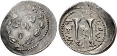 The Bar Kochba Revolt JUDAEA. Bar Kokhba. 132-135 CE. AR Zuz (22mm, 3.41 g). Mint in Judaea. Dated year 2 (133/34 CE). "SMA" (abbreviating Simon in paleo-Hebrew) within wreath / "Year two for the free
