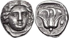 ISLANDS off CARIA, Rhodos. Rhodes. Circa 404-385 BC. AR Tetradrachm (21mm, 15.05 g, 12h). Head of Helios facing slightly right / Rose with bud to right; POΔION above, phiale and Φ to left; all within 