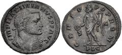 Galerius. AD 305-311. Æ Follis (24mm, 6.41 g, 12h). Lugdunum (Lyon) mint, 1st officina. Struck November-December AD 307. Laureate and cuirassed bust right / Genius standing left, holding patera and co