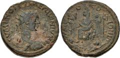 Roman Provincial CILICIA, Mallus. Hostilian. As Caesar, AD 250-251. Æ (30mm, 16.21 g, 6h). Radiate, draped, and cuirassed bust right, seen from behind / Tyche seated left on rocks, holding grain ears,
