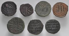 Large Lots BYZANTINE. Lot of seven (7) bronze issues. Includes: Justin I and Justinian I. Æ Follis // Justin II, with Sophia. Æ Follis // Maurice Tiberius. Æ Follis // Phocas. Æ Follis // Leo VI. Æ Fo