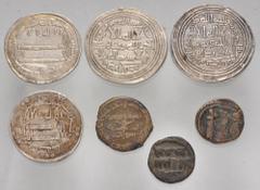 Large Lots ISLAMIC. Umayyad - Abbasid. Lot of four AR Dirhams and three Æ Fulus. All coins: Umayyad Caliphate: Darabjird. AH 97. AR Dirham // al-Samiya. AH 131. AR Dirham // Kirman. AH 91. AR Dirham /