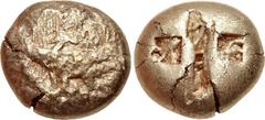 IONIA, Uncertain. Circa 650-600 BC. EL Stater (17mm, 14.16 g). Milesian standard. Figural-on-striated type. Crude chimaira(?) right on striated background / Central oblong punch flanked by two square 