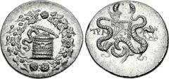 LYDIA, Tralleis. Circa 166-67 BC. AR Tetradrachm (29mm, 12.64 g, 1h). Cistophoric type. Struck circa 155-145 BC. Cista mystica with serpent; all within ivy wreath / Two serpents entwined around bow an