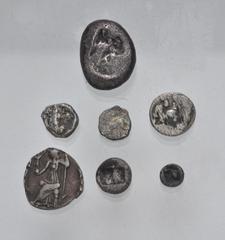 Large Lots MIXED. Greek - Roman Imperial. Lot of seven (7) silver issues. Includes: Greek: Persia (3) // other (3) // Roman Imperial: AR Siliqua. Average Fine, porosity, one chipped, the siliqua heavi