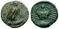 SICILY, Akragas Estimate $300 SICILY, Akragas . Circa 425-406 BC. Æ Onkia (3.15 gm). AK-PA, eagle standing right, with head reverted, on a fish / Crab, fish left below; pellet between crab's claws. SN