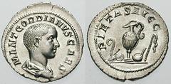 GORDIAN III Estimate $750 GORDIAN III, as Caesar. 238 AD. AR Denarius (2.72 gm). M ANT GORDIANVS CAES, bare-headed and draped bust right, seen from behind / PIETAS AVGG, augur's wand, sacrificial knif