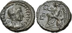 Roman Provincial EGYPT, Alexandria. Valerian I. AD 253-260. Potin Tetradrachm (22mm, 11.32 g, 12h). Dated RY 5 (AD 257/8). Laureate and cuirassed bust right / Nike seated left on cuirass, holding wrea