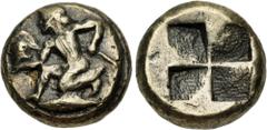 Greek MYSIA, Kyzikos. Circa 550-450 BC. Fourrée Hekte – Sixth Stater (11mm, 2.36 g). Youthful male figure, holding Corinthian helmet in right hand, sword in left, kneeling left on tunny left / Quadrip