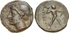 Greek BRUTTIUM, The Brettii. Circa 216-214 BC. Æ Half – Triobol (19mm, 5.82 g, 1h). Second Punic War issue. Head of Nike left, wearing stephane; small Γ behind neck, [dolphin below?] / Zeus standing r