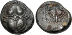 Greek KYRENAICA, Kyrene. Circa 490-475 BC. AR Drachm (12.5mm, 3.37 g). Asiatic standard. Two silphion fruits set base-to-base; pellet between, leaves at sides between / Facing head of lion within incu