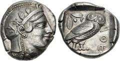 Greek ATTICA, Athens. Circa 454-404 BC. AR Tetradrachm (23mm, 17.18 g, 8h). Helmeted head of Athena right, with frontal eye / Owl standing right, head facing, closed tail feathers; olive spray and cre