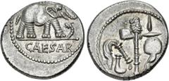 Roman Republican The Caesarians. Julius Caesar. April-August 49 BC. AR Denarius (17mm, 3.90 g, 9h). Military mint traveling with Caesar. Elephant advancing right, trampling on horned serpent / Emblems