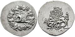 MYSIA, Pergamon. Estimate $250 MYSIA, Pergamon.Circa 76-67 BC. AR Cistophoric Tetradrachm (12.27 gm). Cista mystica with serpent; all within ivy wreath / Bow-case with serpents; snake-entwined staff t