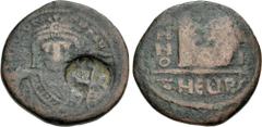 Byzantine Heraclius. 610-641. Æ Follis (26.5mm, 9.94 g, 12h). Countermarked for reevaluation in Syria/Palestine. Applied circa 633-636. Heraclius monogram within incuse circle / Blank. Schulze et al, 