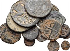 MIXED. Roman-Early Medieval. Lot of fourteen (14) mostly Byzantine bronze coins. Mostly Byzantine, including the following: Anastasius. Æ Nummus // Justin I. Æ Pentanummium // Justinian I. Æ Pentanumm