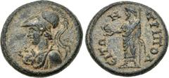 LYDIA, Tripolis. Pseudo-autonomous issue. temp. Antonines, AD 138-192. Æ (21mm, 5.73 g, 12h). Helmeted bust of Athena left, wearing aegis / Zeus Lydios standing left, holding eagle and leaning on scep