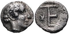 IONIA, Kolophon. Circa 450-410 BC. AR Tetartemorion (7mm, 0.27 g, 12h). Laureate head of Apollo right / TE monogram (= tetartemorion ); astragalos to left; all within incuse square. Milne, Colophon 35