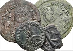 BYZANTINE. Lot of four (4) bronze coins from Justinian to Leo VI. Includes: Justinian I. Æ Follis. Constantinople mint. Dated RY 13 // Justinian I. Æ Follis. Constantinople mint. Dated RY 15 // Justin