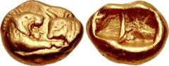 KINGS of LYDIA. Kroisos. Circa 560-546 BC. AV Sixth Stater (9mm, 1.77 g). Heavy standard. Sardes mint. Struck circa 550-546 BC. Confronted foreparts of lion right and bull left / Two incuse square pun