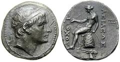 SYRIA, Seleukid Kings. Antiochos II. Estimate $500  SYRIA, Seleukid Kings. Antiochos II. 261-246 BC. AR Tetradrachm (16.64 gm). Aegae mint. Diademed head right / Apollo seated left on omphalos, holdin