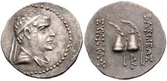 BAKTRIA, Greco-Baktrian Kingdom. Eukratides I Megas. Circa 170-145 BC. AR Obol (13mm, 0.67 g, 11h). Attic standard. Diademed and draped bust right / Palms and piloi of the Dioskouroi; monogram below. 