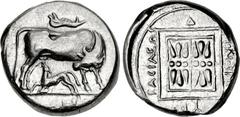 KINGS of ILLYRIA. Monounios. Circa 305/0-280/75 BC. AR Stater (21mm, 10.83 g, 10h). Cow standing right, looking back at suckling calf standing left below; above, jawbone of boar right / Double stellat